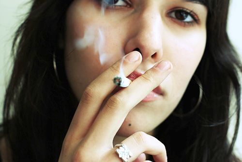 Smoking Teenage Girl